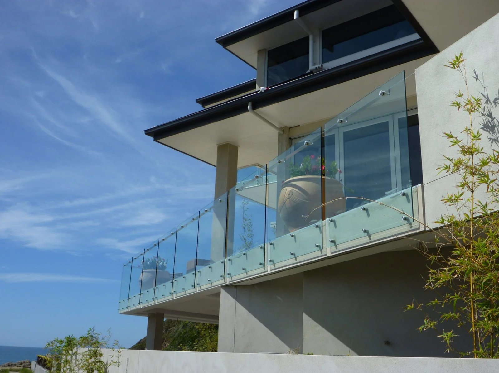 Frameless glass balustrade on a coastal balcony