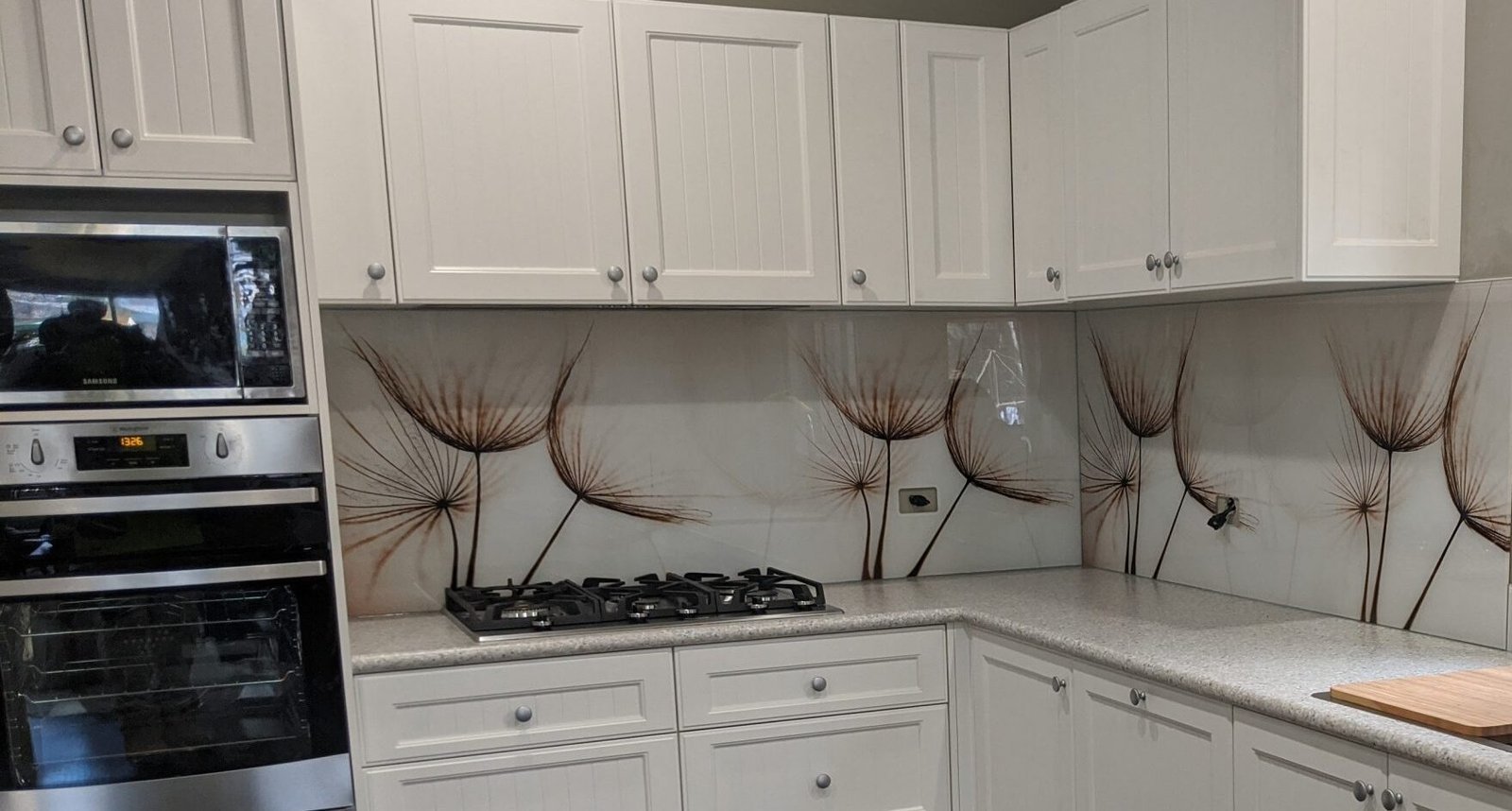 Custom printed glass splashback with dandelion design by Harbour Glass in Coffs Harbour