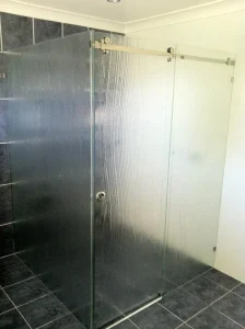 Slumped frameless slider
