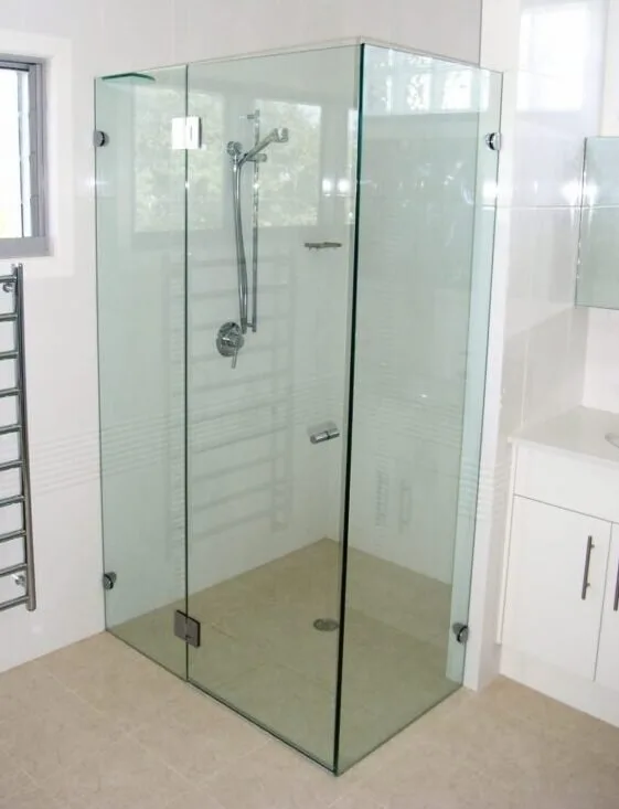 Custom 90-degree frameless shower screen installed in Coffs Harbour bathroom